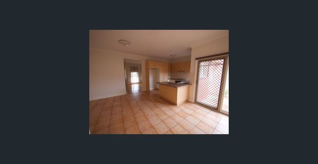 Terrific 3-Bedroom Unit in a Prime Location! - Photo 1