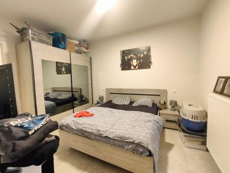 Energiezuinig appartement met tuin en autostaanplaats - Photo 3