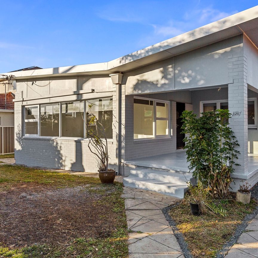 Spacious Four Bedroom Home with Brand New Updates - Photo 1