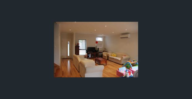 Luxurious Living In Heart Of Town - Photo 1