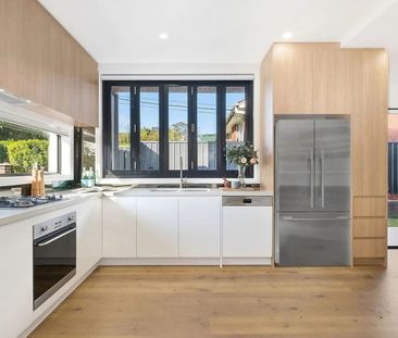 Contemporary Luxury Meets Effortless Family Living - Photo 3
