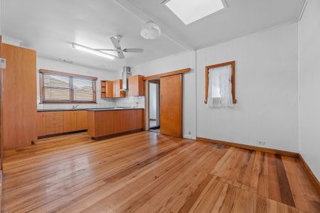 Comfortable 4-Bedroom Home in a Sought-After Location - Photo 3