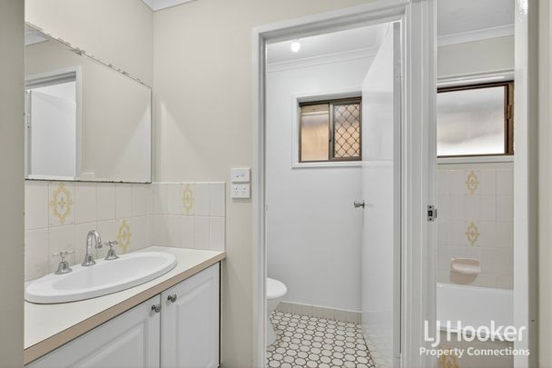 Low Set Brick Home Offering Comfort, Convenience and Charm - Photo 1