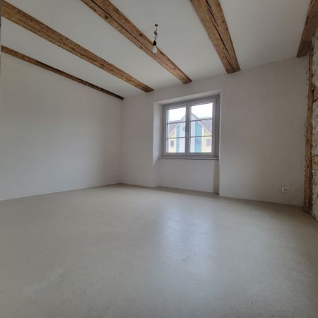 Neubau - Charmante Wohnung mit Sichtbalken und grossem Turmbalkon! - Foto 2