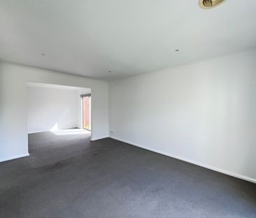 Spacious Three-Bedroom Residence with Double Garage & Generous Fron... - Photo 3