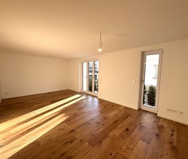 Moderne 2-Zimmer-Wohnung in hochwertigem Neubau mit Terrasse & Stel... - Foto 3