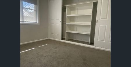 Spacious 3 Bedroom Renovated Unit - Photo 3