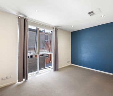 Secure, modern living in the heart of the CBD! - Photo 1