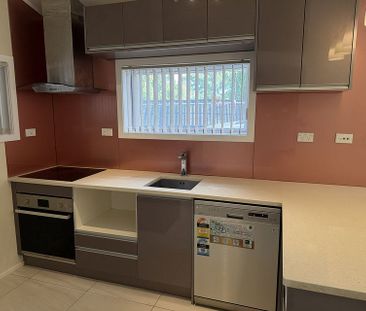 Charming 2BR Home with Modern Comforts - Photo 2