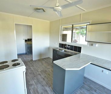 Spacious Family Home with Huge Yard, Side Access & Plenty of Storage! - Photo 6