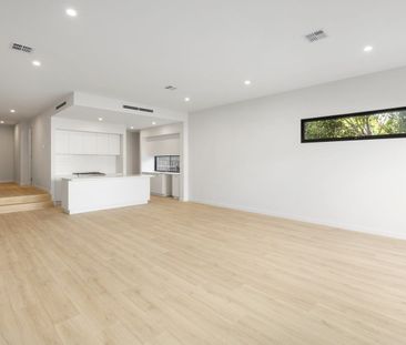 This luxurious brand new townhouse will exceed all your expectations. - Photo 1