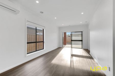 Modern & Spacious 4-Bedroom Home in a Peaceful Beveridge Location - Photo 3