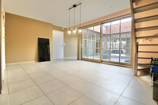 Ruime, energiezuinige woning met 2 slpk, garage, patio, tuin en terras voor 1.095 EUR/mnd - Photo 1