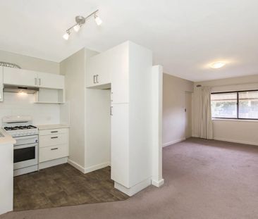Charming 1-Bedroom Unit in Prime Location - Photo 2