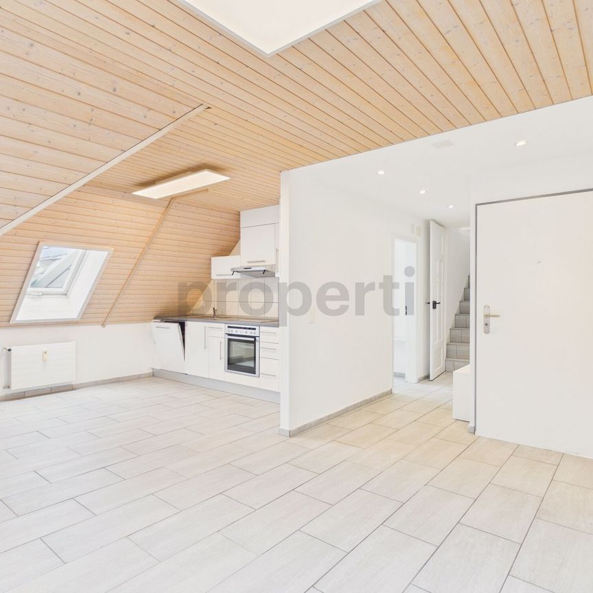 Charming 3.5-room apartment in Rorschach with lake view - Photo 1