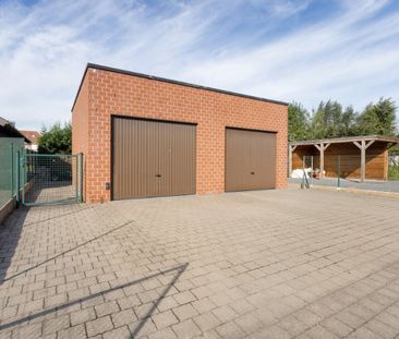 Toffe stadswoning met 2 slaapkamers en gezellige tuin met garage. - Photo 2