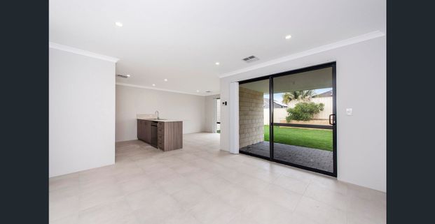Brand New, Light-Filled & Designed for Easy Living - Photo 1