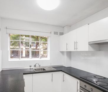 UPDATED 2-BEDROOM APARTMENT IN GREAT LOCATION! - Photo 1