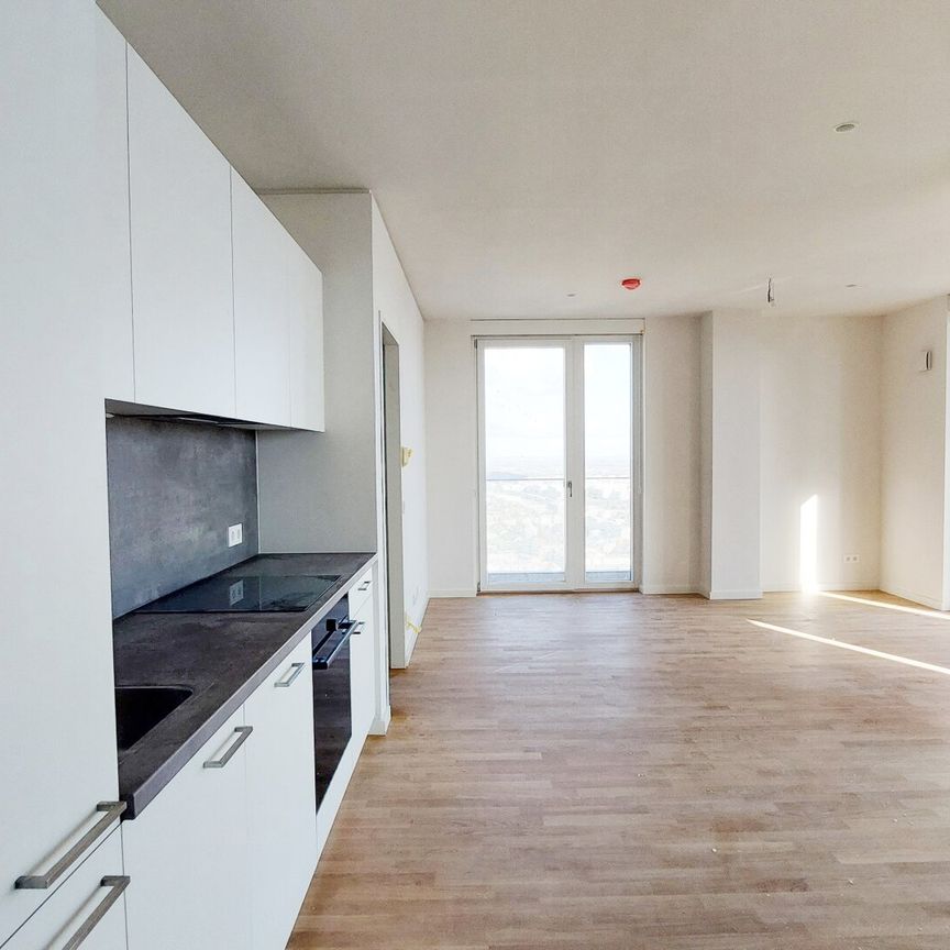 Wohnen mit Skyline-Flair – Rooftop Pool & Fitness bei der U1 - Photo 1