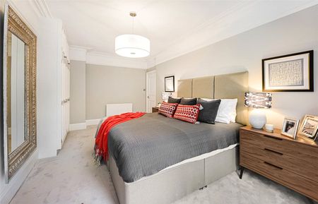 A three bedroom apartment of approximately 1,672 square feet. - Photo 5