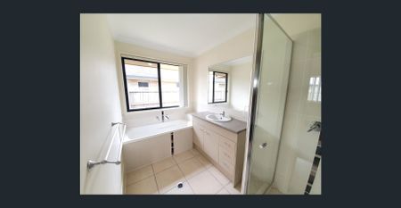 SPACIOUS 4 BEDROOM FAMILY HOME WITH OPEN KITCHEN LIVING DINING WITH SEPARATE CARPETED FAMILY ROOM. VERY GOOD SIZE BEDROOMS. 5 MINUTES TO THE HIGHWAY. - Photo 3