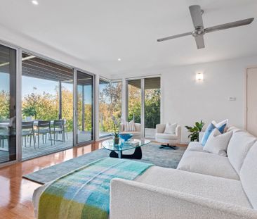 Absolute Beachfront Luxury with Panoramic Bay Views and Beach Access- Furnished or unfurnished options available! - Photo 1