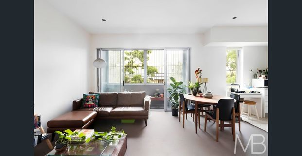 LEAFY RETREAT WITH DUAL BALCONIES - Photo 1