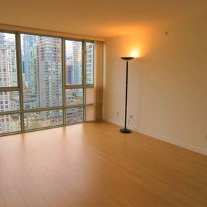 2 Bedrooms (1 Bedroom + Solarium + Den) Available for Rent - Photo 2