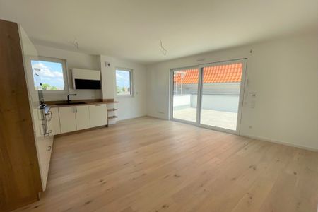 Moderne Dreizimmerwohnung mit Dachterrasse, Einbauküche und TG-Stellplatz mit Ladestation - Photo 5