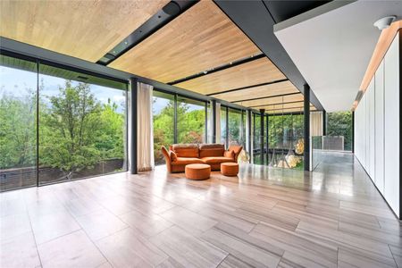 A unique, sustainable, Stanton Williams family home situated within the Highgate Conservation area of North London, with views to Hampstead Heath. - Photo 2