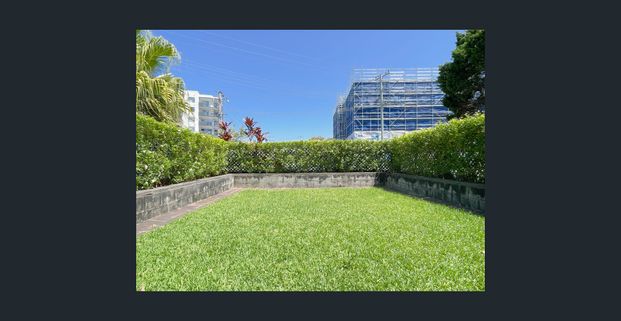 TOWNHOUSE WITH LARGE GRASSED COURTYARD - Photo 1