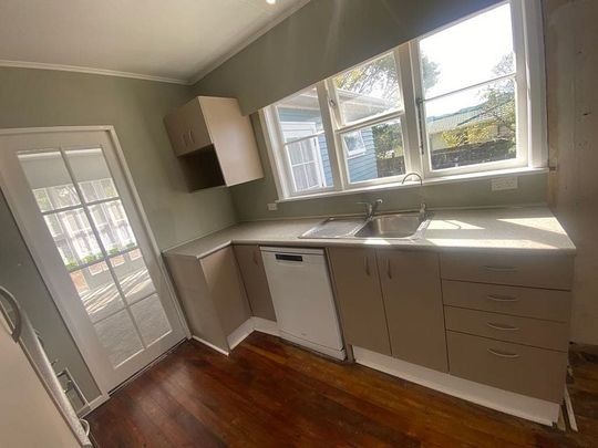"4 BEDROOM HAVEN WITH DOUBLE DECK IN WAINUIOMATA" - Photo 1