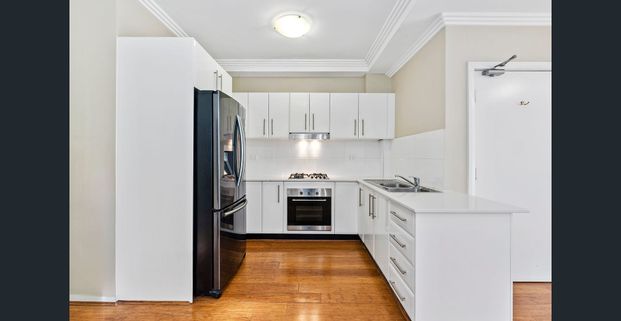 NORTH FACING LIVING WITH LEAFY OUTLOOK - Photo 1