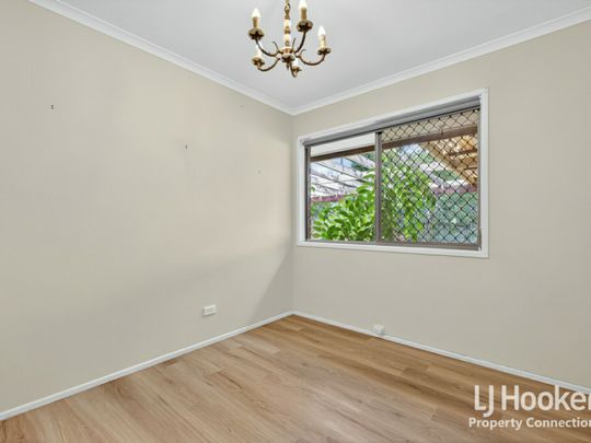 Low Set Brick Home Offering Comfort, Convenience and Charm - Photo 1