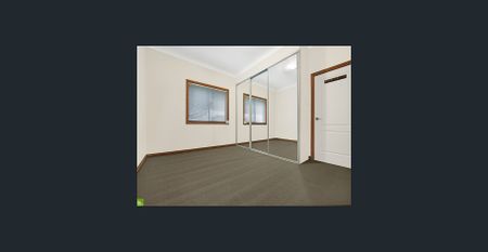 Beautifully Spacious Family Home - Lawn Maintenance Included For Your Convenience! - Photo 2