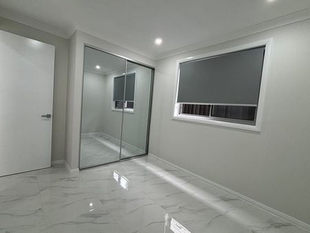 Brand New 5 Bedroom Family Home - Photo 5