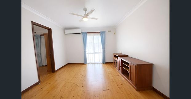 Well-Presented Home with Flexible Layout, Large Backyard & Rear Access - Photo 1