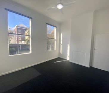 Neat Two Bedroom Unit in CBD Location! - Photo 1