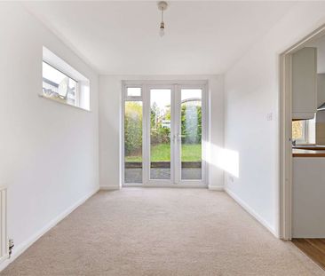 A three bedroom detached home with garage and off street parking. - Photo 4