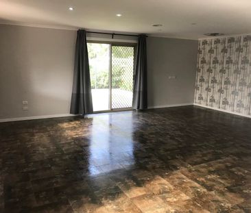 Spacious Family Home with Solar Panels & Huge Shed! - Photo 2