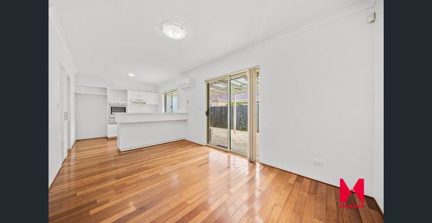 Spacious Riverside Townhouse in Prime Location - Photo 1