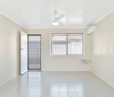 Immaculately renovated unit in perfect city location - Photo 1