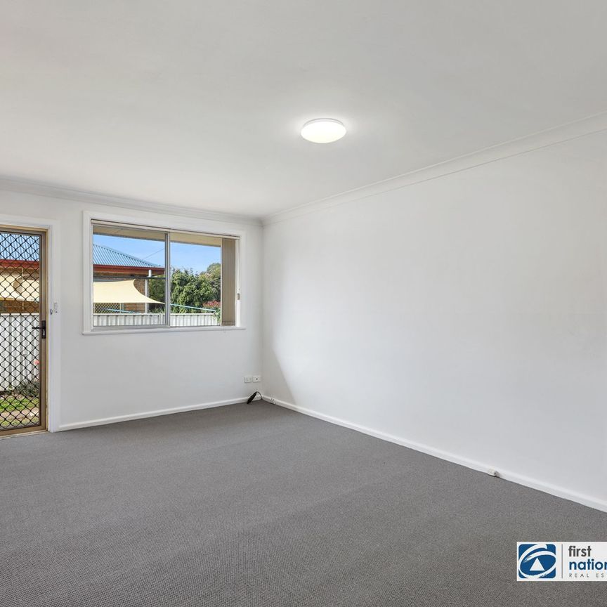 Freshly renovated 2-bedroom unit - Photo 1