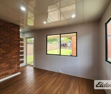 Freshly Updated Family Home in a Convenient Regents Park Location - Photo 4