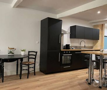 Grand T1 de 74.61 m2 - Photo 1