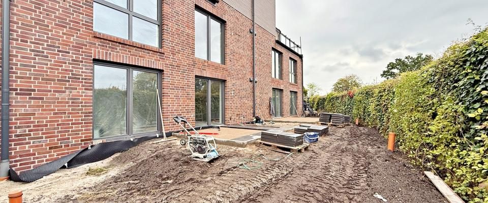 Erstbezug! Obergeschosswohnung in zentraler Lage von Augustfehn | Lift und Einbauküche - Photo 1