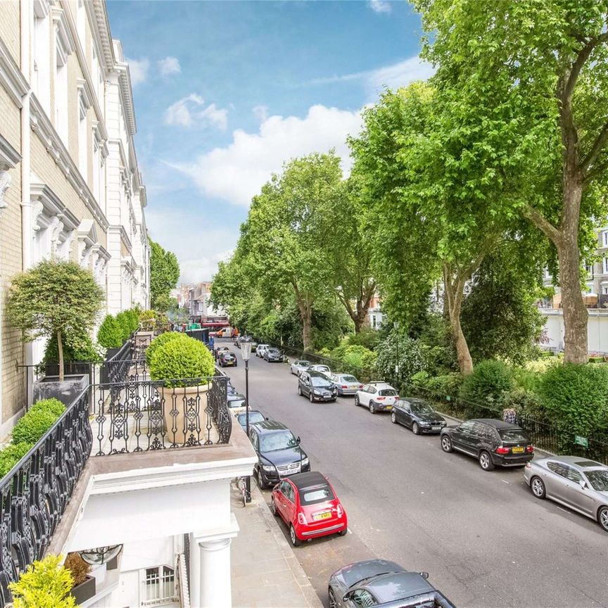 Bright split level period conversion overlooking Onslow Gardens, with wooden floors, high ceilings and private terrace, moments from the amenities of South Kensington. - Photo 1