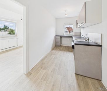 Erstbezug nach Sanierung mit neuer Einbauküche - Foto 5