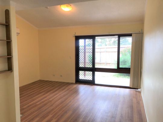 Three Bedroom Townhouse with Air Conditioning - Photo 1