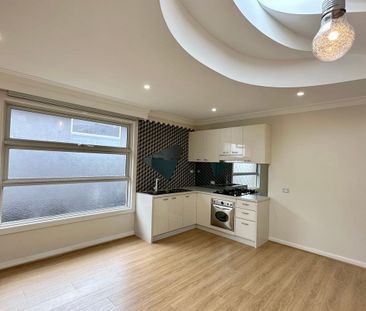 ARCHITECTURALLY DESIGNED TOWNHOUSE IN THE MCKINNON SCHOOL ZONE - Photo 6